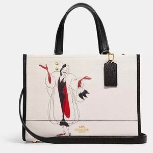 Disney X Coach Dempsey Carryall With Cruella Motif